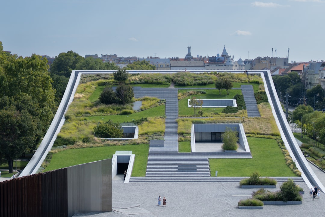 modern-building-with-a-green-roof-and-geometric-design-eqivsmu-byq